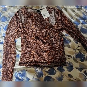Long sleeve cheetah print shirt.